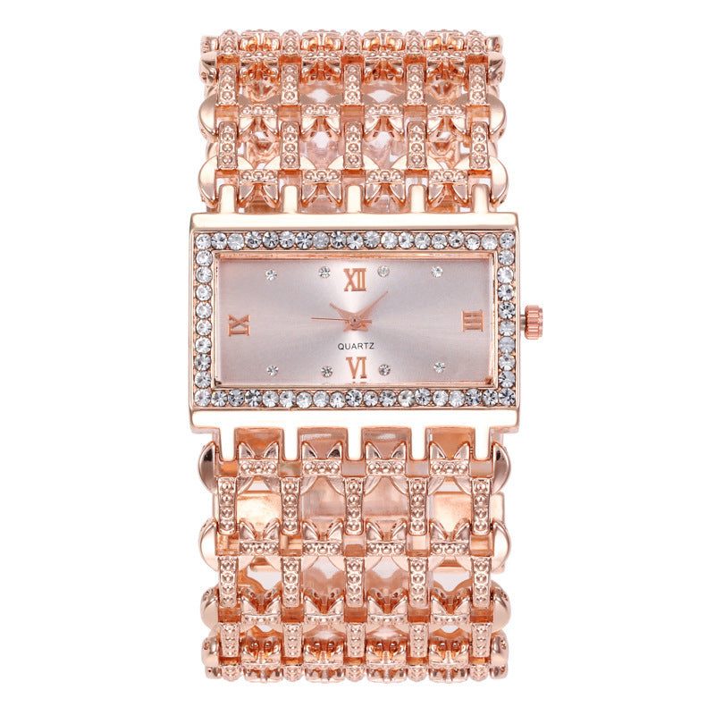 Reloj de mujer rectangular con strass y brazalete ancho calado