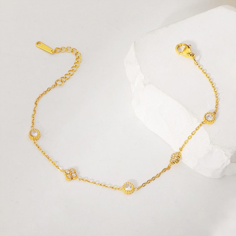 Bracelet fin plaqué or à motif fleur et zircons — acier inoxydable