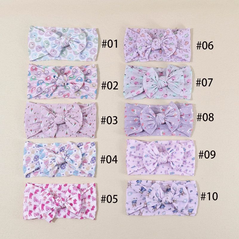 Fascetta per capelli bebè con fiocco in nylon morbido — 16 × 8 cm