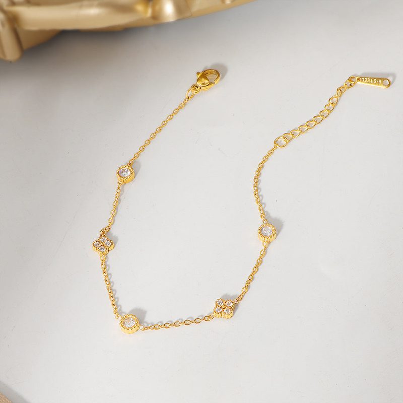Bracelet fin plaqué or à motif fleur et zircons — acier inoxydable