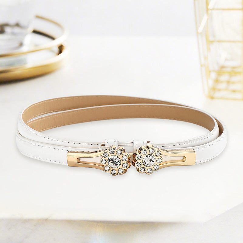 Cinto fino com flor cravejada de strass — regulável