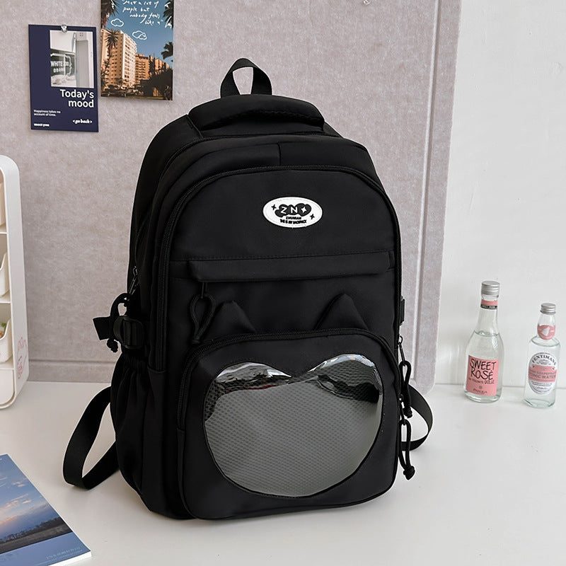 Mochila escolar con chapas — con o sin colgante — color
