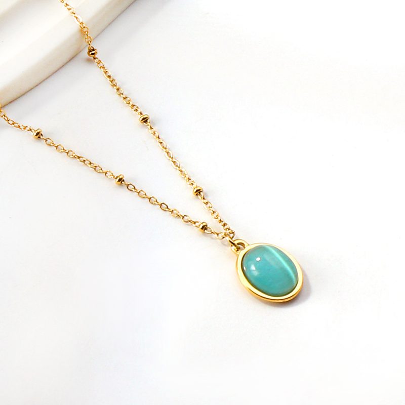 Collier doré à pendentif pierre colorée — acier inoxydable
