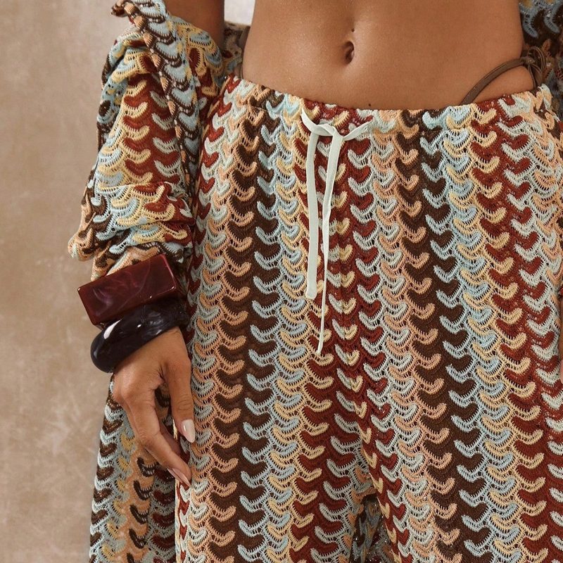 Openwork crochet-knit beach trousers — wave pattern