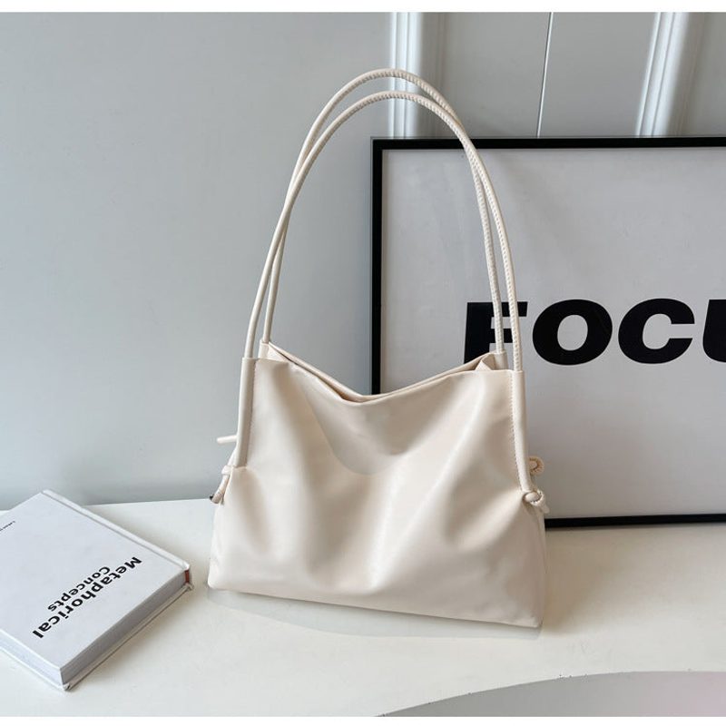 Large faux leather shoulder tote — inner phone pocket