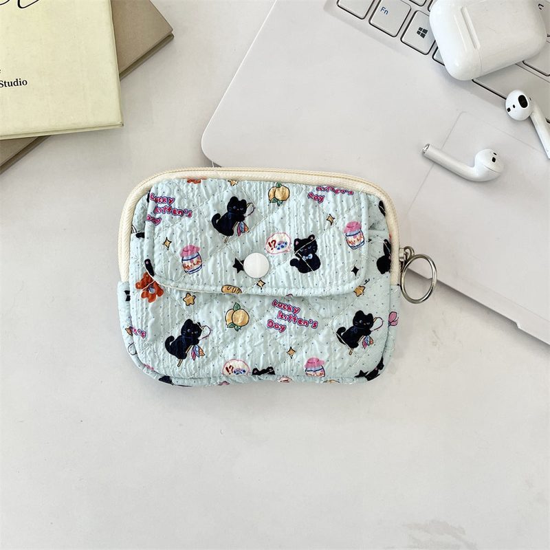 Quilted coin purse with flap — printed patterns, ring