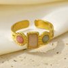 Trois cabochons, rectangle central