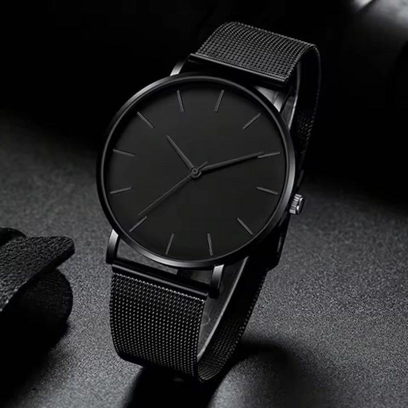 Schwarze ultraflache Herrenuhr mit Milanaise-Armband