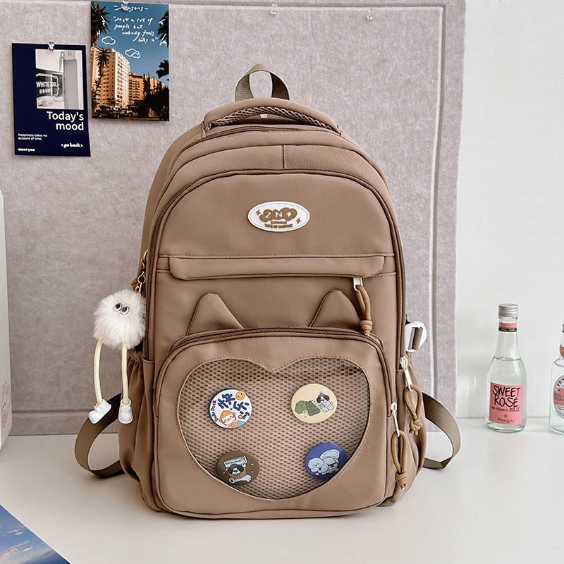 Mochila escolar con chapas — con o sin colgante — color