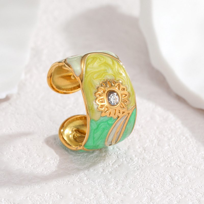 Bague jonc émaillée à fleur dorée — acier inoxydable, pierre centrale