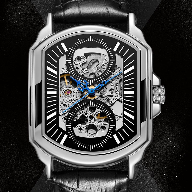 Reloj mecánico rectangular con esfera abierta y correa de piel