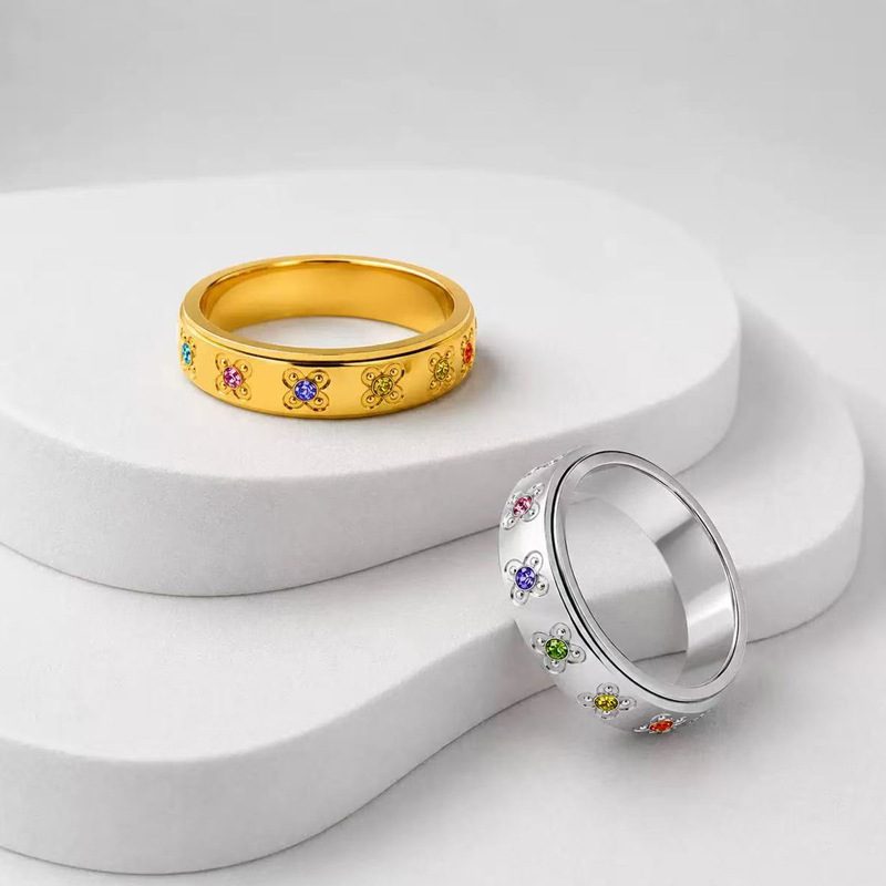 Bague à anneau tournant en acier inoxydable — fleurs serties de pierres de couleur