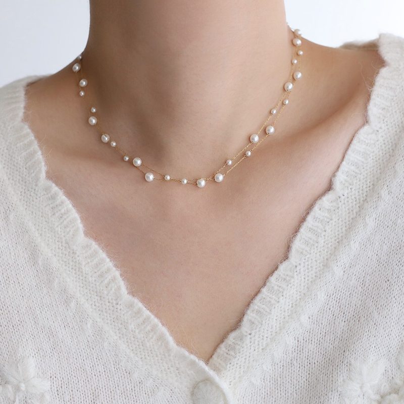 Collier double rang à perles semées — chaîne fine dorée