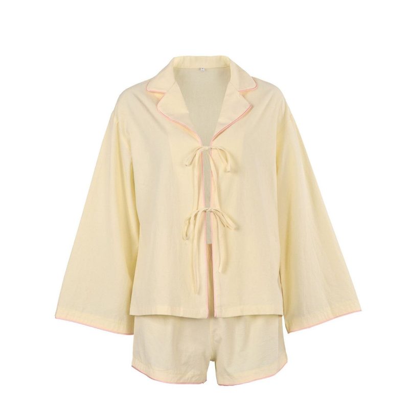Ecru pyjamas with pink piping, tie jacket and shorts