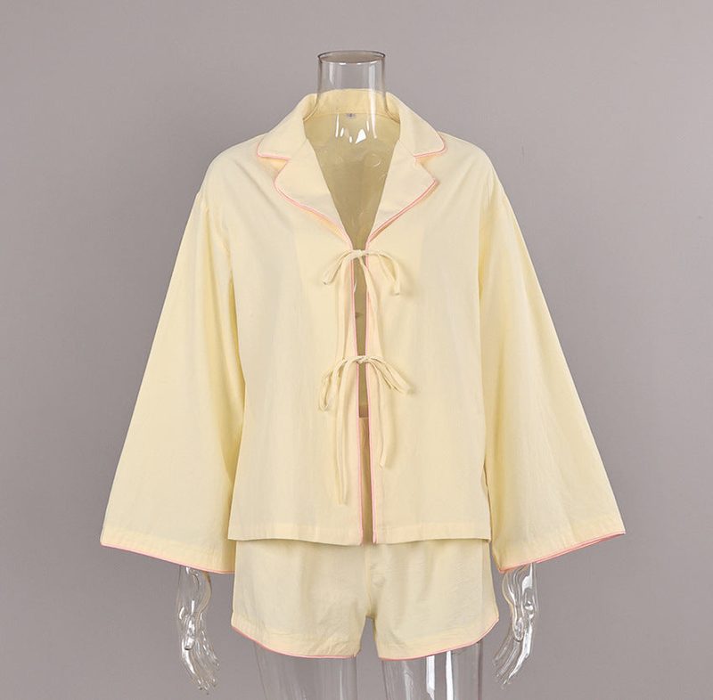 Ecru pyjamas with pink piping, tie jacket and shorts