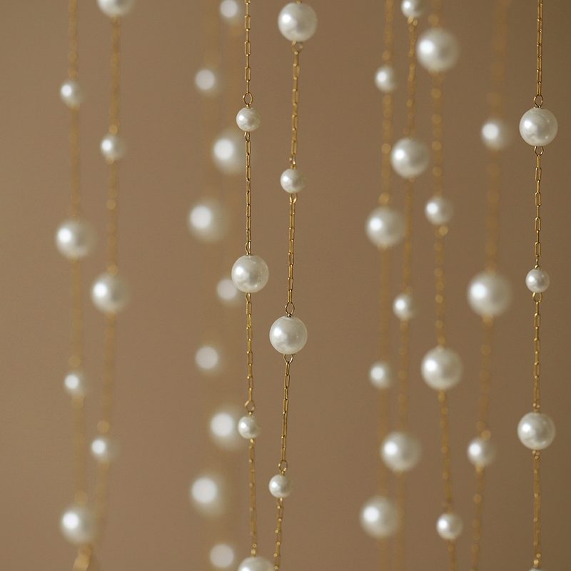 Collier double rang à perles semées — chaîne fine dorée