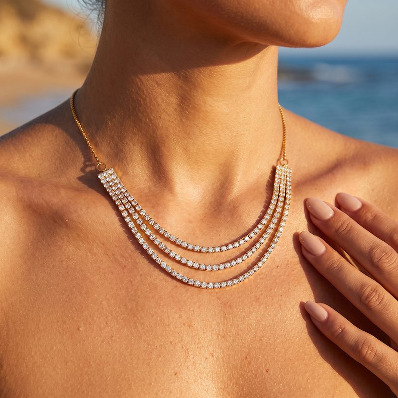 Collier rivière triple rang serti de zircons — doré