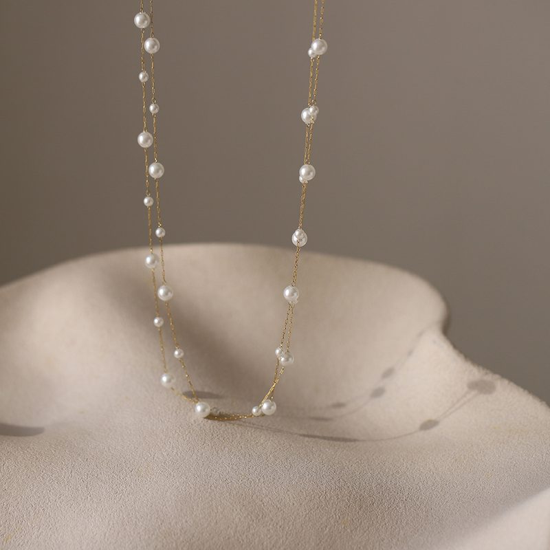 Collier double rang à perles semées — chaîne fine dorée