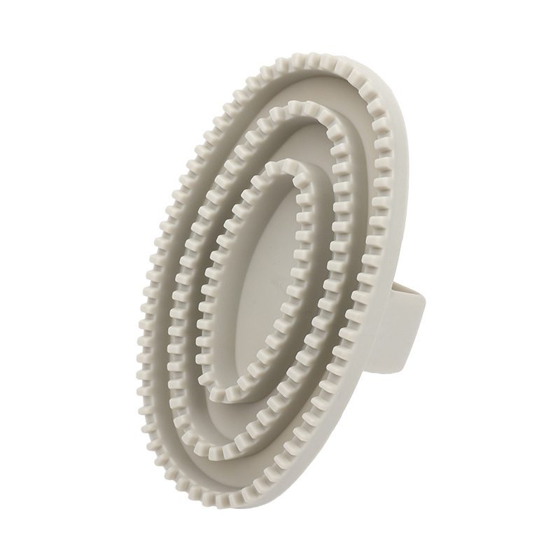 Brosse étrille en caoutchouc souple pour le bain du chien