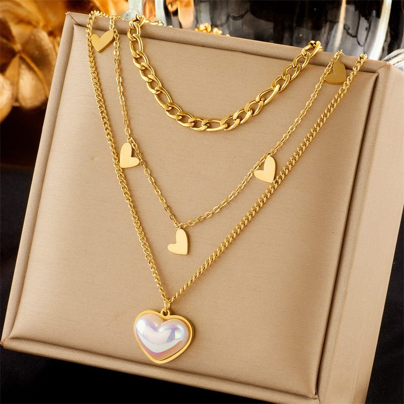 Collier multirangs doré en acier inoxydable — motif au choix
