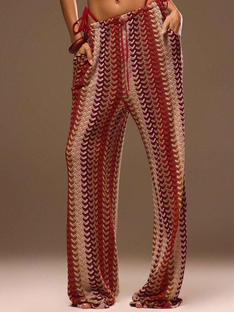 Openwork crochet-knit beach trousers — wave pattern