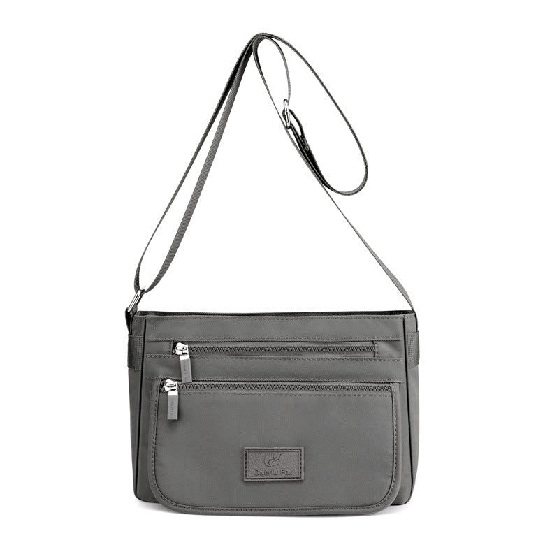 Women’s structured handbag — short handle and shoulder strap — colour