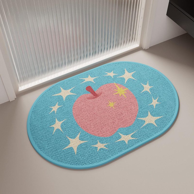 Oval apple-print bath mat — rounded edge