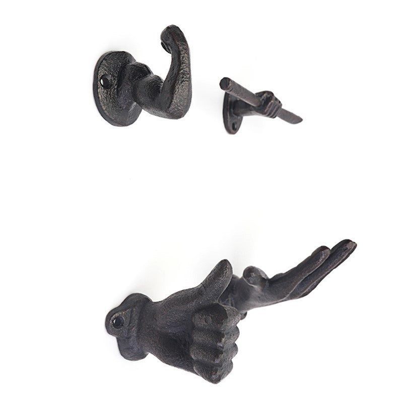 Gietijzeren wandhaak, hand of arm in reliëf